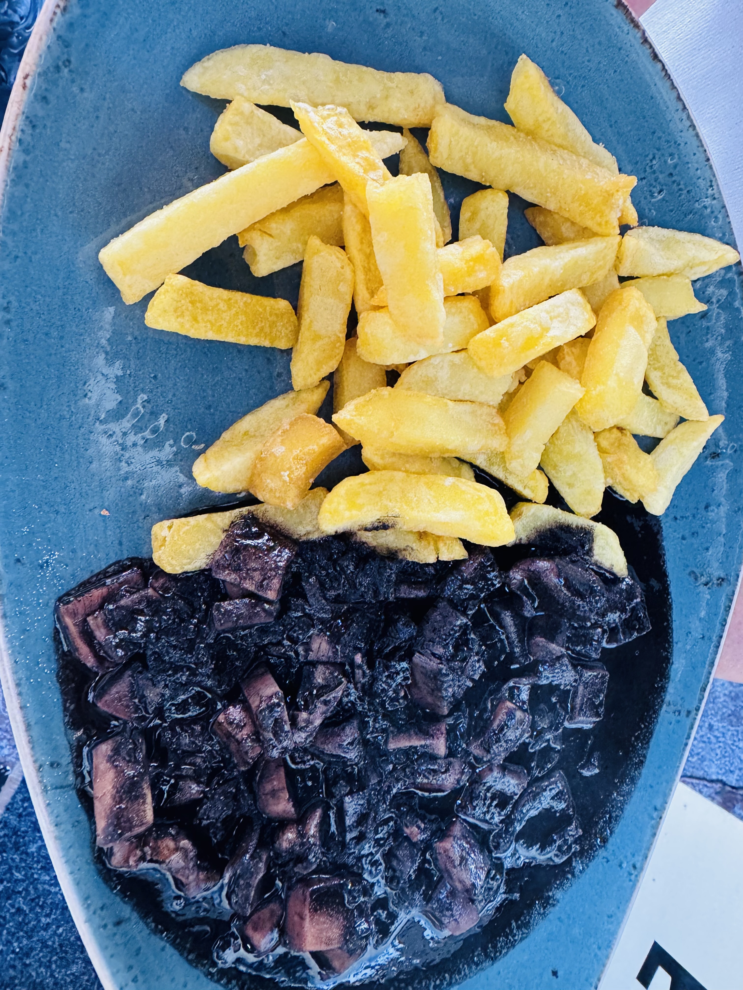Squid Cooked in Their Ink